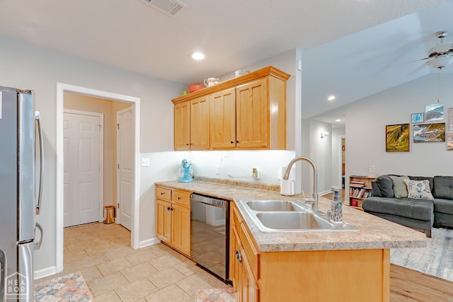 1409 Hemingway Cir, Jonesboro, AR 72405 - kitchen featuring dishwashing machine, a sink, freestanding refrigerator, light countertops, and open floor plan