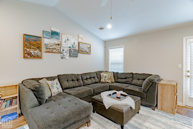 1409 Hemingway Cir, Jonesboro, AR 72405 - living area featuring vaulted ceiling, light wood finished floors, and ceiling fan