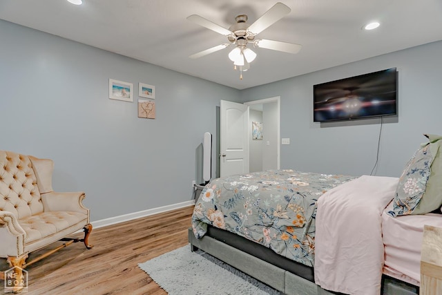 1409 Hemingway Cir, Jonesboro, AR 72405 - bedroom with wood finished floors, recessed lighting, baseboards, and a ceiling fan