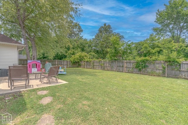 1409 Hemingway Cir, Jonesboro, AR 72405 - view of yard featuring a patio
