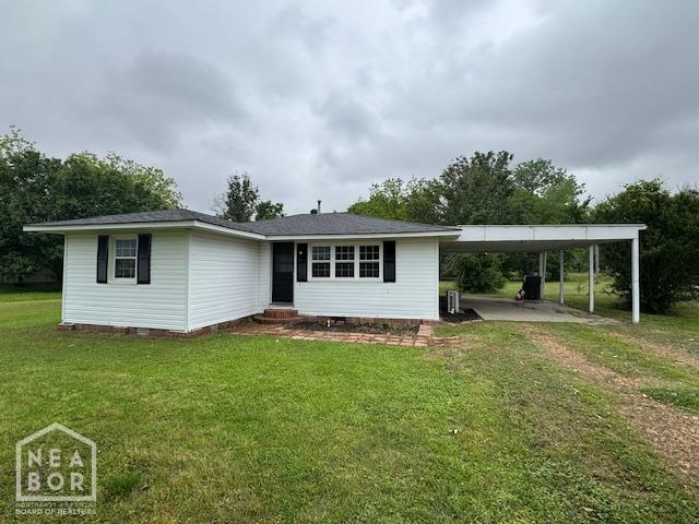 330 E Oak St E, Bono, AR 72416 - view of front of property with crawl space, a front lawn, entry steps, an attached carport, and driveway