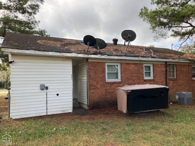 3306 Meador Rd, Jonesboro, AR 72401 - back of property with brick siding and central AC