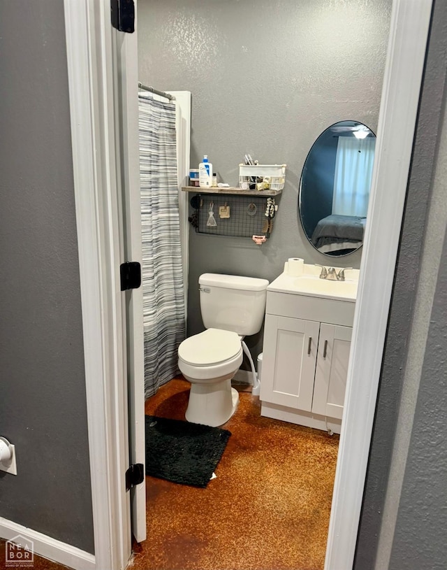 415 NW 3rd St, Walnut Ridge, AR 72476 - full bath with vanity, toilet, and a shower with curtain