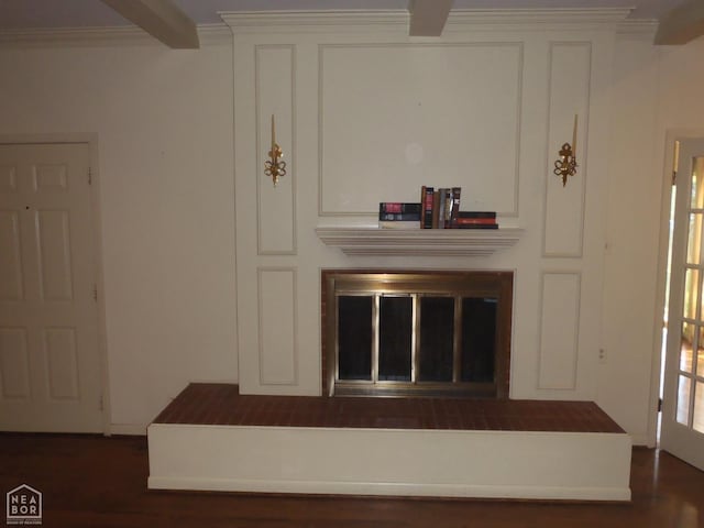4 Virginia Rd, Newport, AR 72112 - detailed view of a glass covered fireplace, crown molding, and wood finished floors