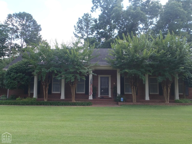 4 Virginia Rd, Newport, AR 72112 - obstructed view of property with a front yard and brick siding