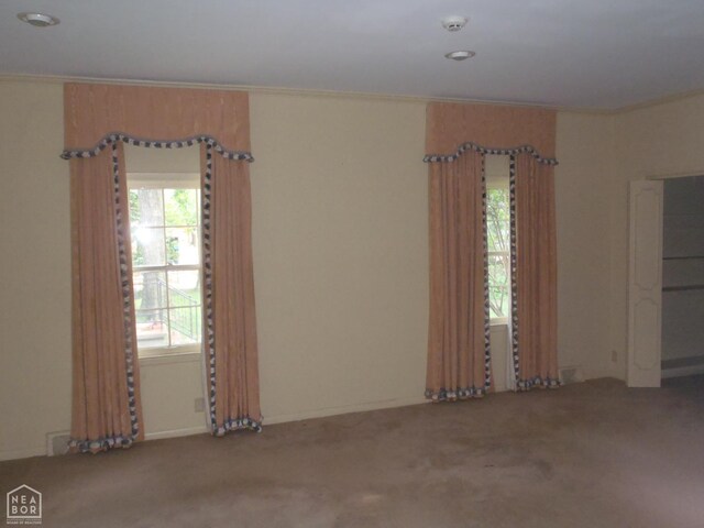 4 Virginia Rd, Newport, AR 72112 - carpeted spare room with a smoke detector and ornamental molding
