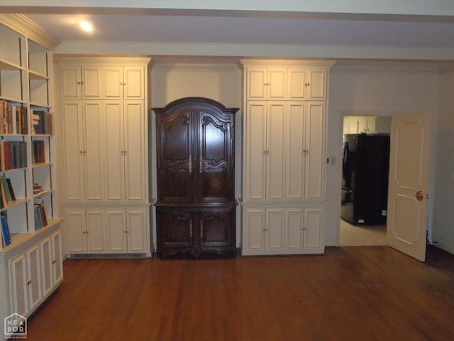 4 Virginia Rd, Newport, AR 72112 - bedroom with freestanding refrigerator and dark wood finished floors