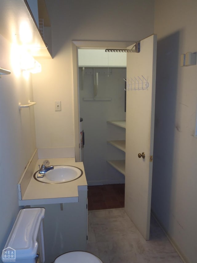 4 Virginia Rd, Newport, AR 72112 - bathroom featuring toilet and vanity