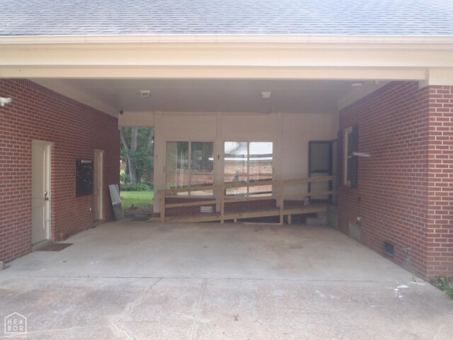 4 Virginia Rd, Newport, AR 72112 - garage with an attached carport and driveway