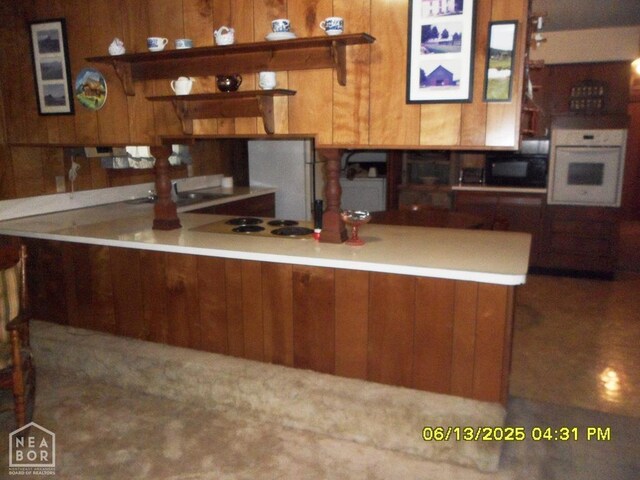 2805 Robinson St, Newport, AR 72112 - kitchen with white oven and black microwave