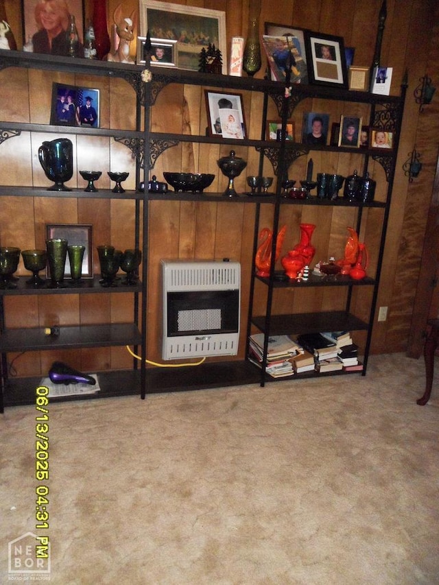 2805 Robinson St, Newport, AR 72112 - wine area featuring heating unit, carpet floors, and wooden walls