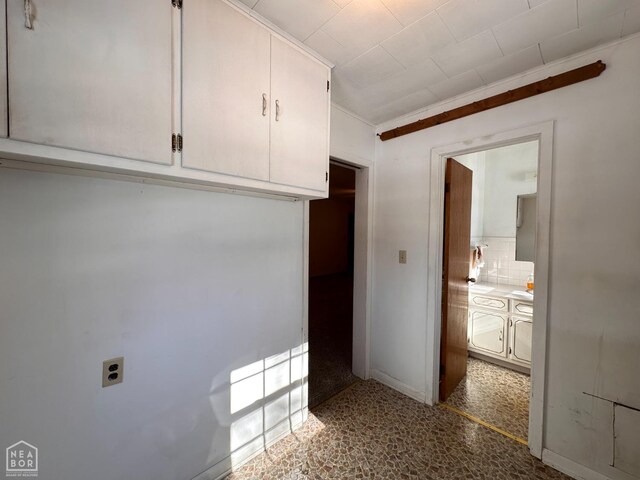 245 S 18th St, Piggott, AR 72454 - clothes washing area with hookup for an electric dryer, baseboards, and laundry area