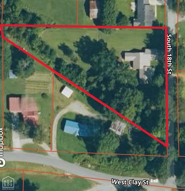 245 S 18th St, Piggott, AR 72454 - aerial overview of property's location with property parcel outlined