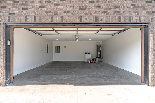 400 Gia St, Bono, AR 72416 - garage featuring water heater and electric panel