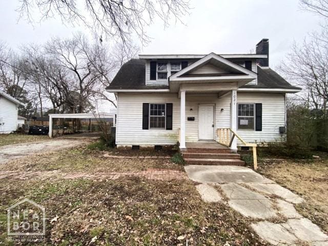 1021 W Jefferson Ave, Jonesboro, AR 72401 - bungalow-style house with a chimney
