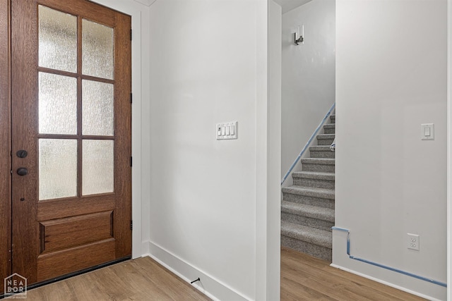 3424 Hudson Dr, Jonesboro, AR 72405 - foyer with wood finished floors and stairway