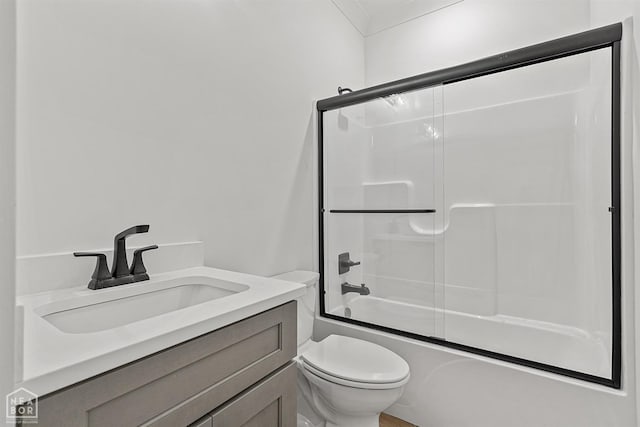 3424 Hudson Dr, Jonesboro, AR 72405 - bathroom featuring toilet, vanity, and shower / bath combination with glass door