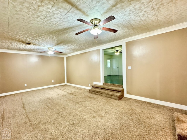 1005 W Lake St, Manila, AR 72442 - carpeted spare room with a ceiling fan, crown molding, and baseboards