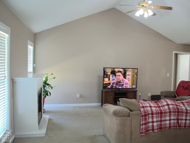 3300 Jeridon Cv, Jonesboro, AR 72404 - living area with a ceiling fan, light carpet, a fireplace, and high vaulted ceiling