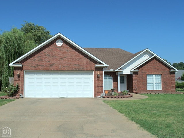 3300 Jeridon Cv, Jonesboro, AR 72404 - ranch-style home with driveway, brick siding, a garage, and a front lawn