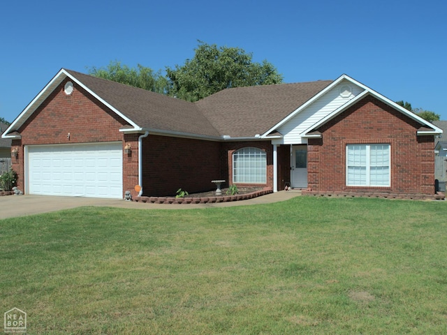 3300 Jeridon Cv, Jonesboro, AR 72404 - ranch-style house with brick siding, an attached garage, a front yard, and driveway