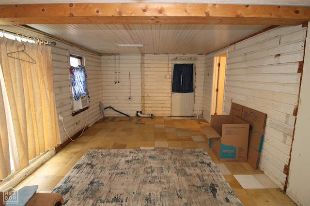 261 Greene Road 507, Lafe, AR 72436 - unfurnished room featuring wood walls and wood ceiling