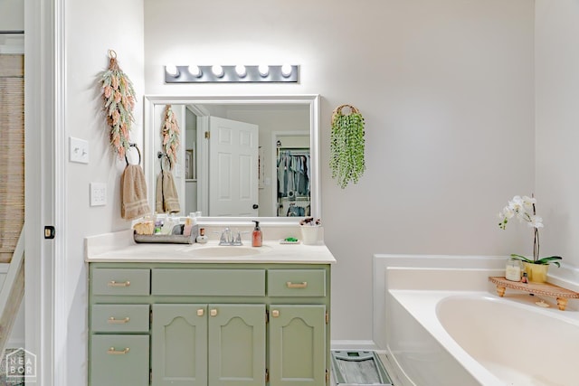 13326 Dixie Ln, Trumann, AR 72472 - bathroom featuring vanity and a garden tub