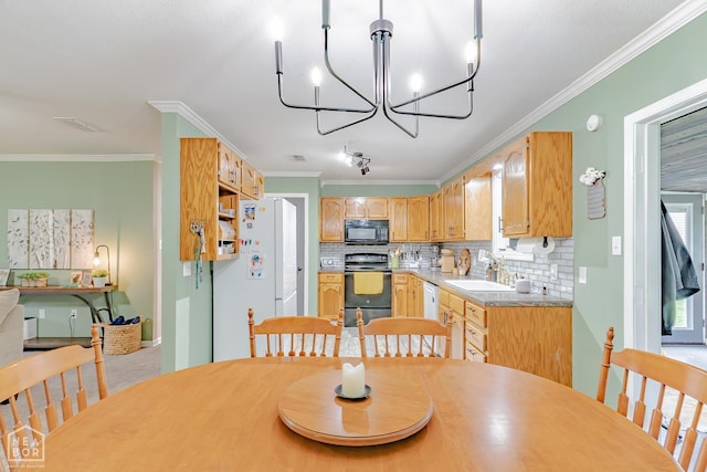 13326 Dixie Ln, Trumann, AR 72472 - dining space featuring a chandelier and crown molding