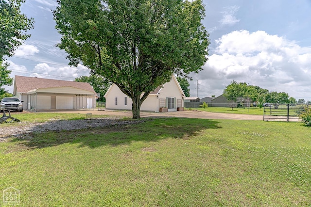 13326 Dixie Ln, Trumann, AR 72472 - view of yard with a detached garage and an outdoor structure