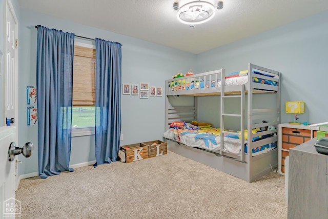 13326 Dixie Ln, Trumann, AR 72472 - bedroom with carpet floors and baseboards