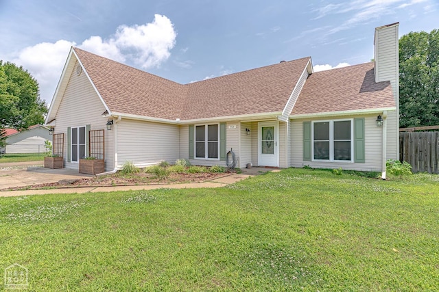 13326 Dixie Ln, Trumann, AR 72472 - view of front of home featuring a chimney and roof with shingles