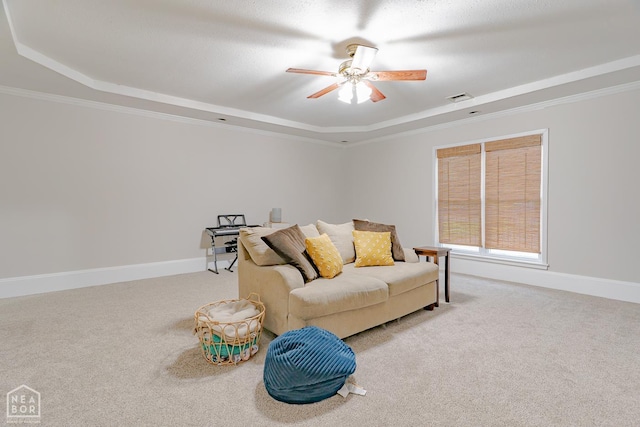 13326 Dixie Ln, Trumann, AR 72472 - living area with a raised ceiling, carpet, ceiling fan, and ornamental molding