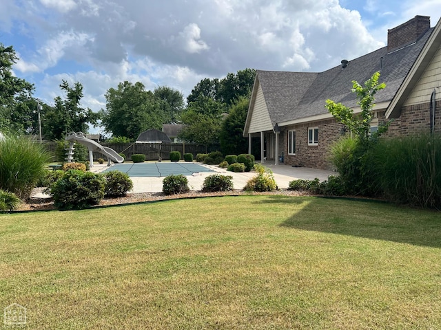 318 Davis St, Manila, AR 72442 - view of yard featuring a patio