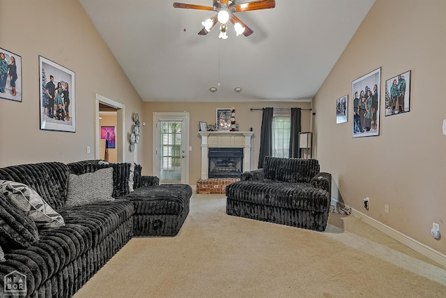 328 Natchez Dr, Jonesboro, AR 72404 - carpeted living room featuring vaulted ceiling, a ceiling fan, and a fireplace