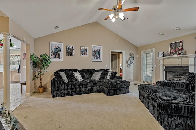 328 Natchez Dr, Jonesboro, AR 72404 - carpeted living room featuring ceiling fan, lofted ceiling, decorative columns, and a fireplace