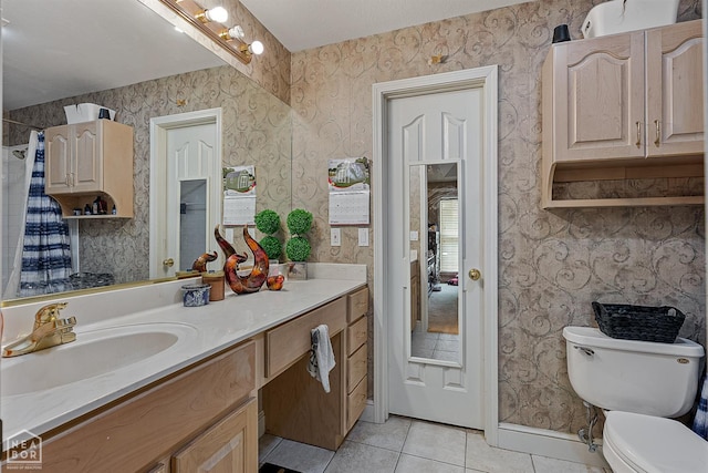 328 Natchez Dr, Jonesboro, AR 72404 - bathroom with tile patterned flooring, vanity, and wallpapered walls