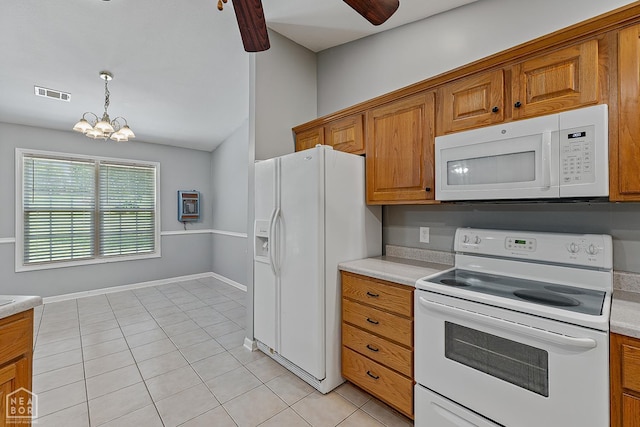 214 Holmes Rd, Jonesboro, AR 72405 - kitchen with white appliances, brown cabinets, light tile patterned floors, a chandelier, and light countertops