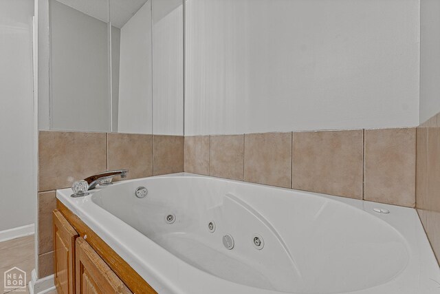 214 Holmes Rd, Jonesboro, AR 72405 - full bath with a whirlpool tub