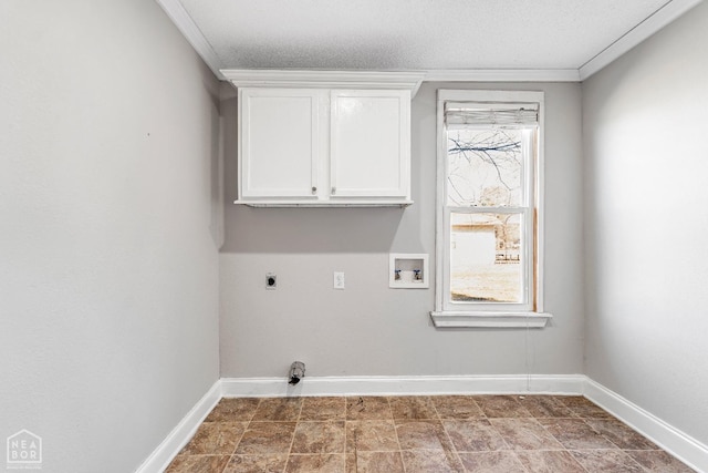 605 SE 2nd St SE, Hoxie, AR 72433 - clothes washing area with hookup for an electric dryer, washer hookup, cabinet space, and a wealth of natural light