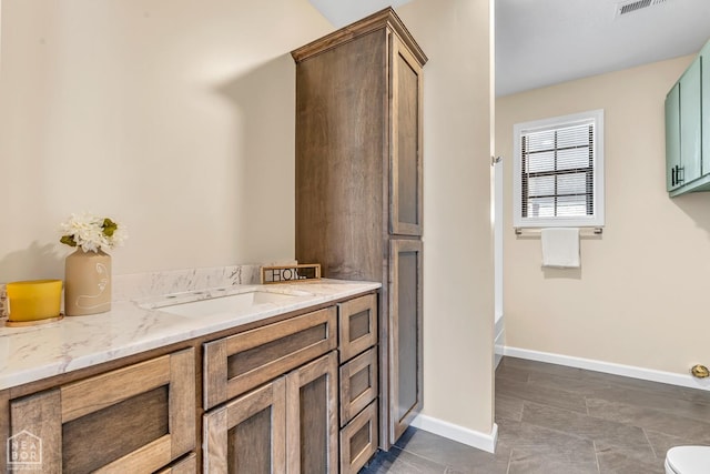 202 S 14th Ave, Paragould, AR 72450 - full bath with vanity, baseboards, toilet, a shower, and tile patterned floors