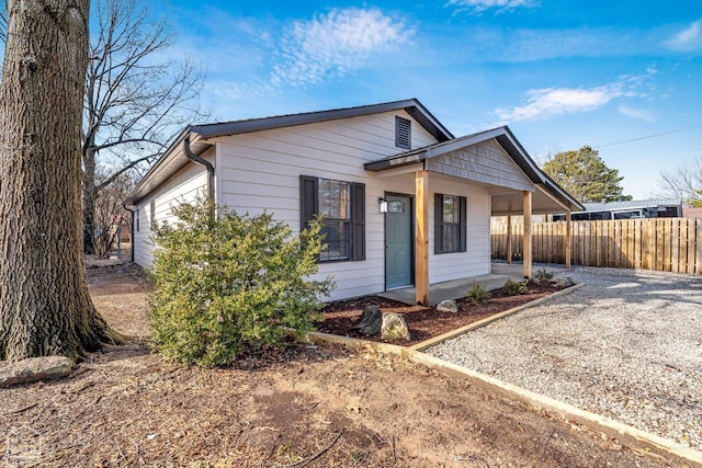 202 S 14th Ave, Paragould, AR 72450 - view of front facade with a porch and driveway