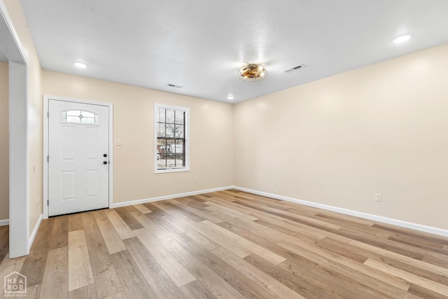 202 S 14th Ave, Paragould, AR 72450 - foyer entrance with light wood-style floors, baseboards, and recessed lighting