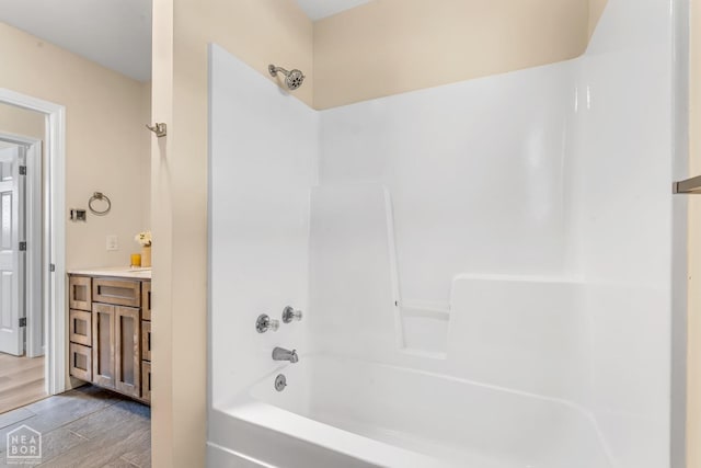 202 S 14th Ave, Paragould, AR 72450 - full bathroom featuring shower / tub combination and vanity