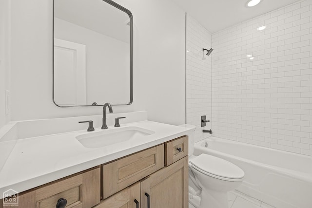 full bathroom with toilet, vanity, and shower / washtub combination