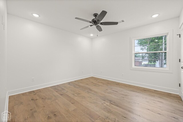 empty room with baseboards, recessed lighting, visible vents, ceiling fan, and light wood finished floors