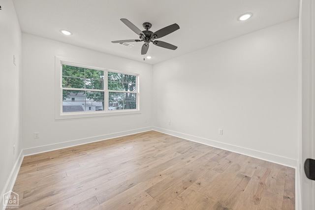 unfurnished room featuring recessed lighting, ceiling fan, light wood finished floors, and baseboards