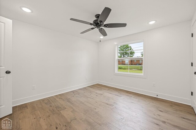 unfurnished room with baseboards, recessed lighting, light wood-type flooring, and a ceiling fan