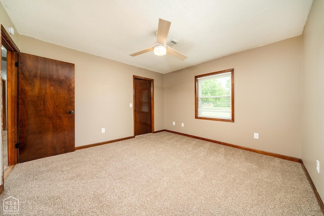 67 Razorback Dr, Hoxie, AR 72433 - unfurnished bedroom featuring light carpet and ceiling fan