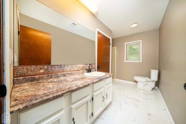 67 Razorback Dr, Hoxie, AR 72433 - bathroom featuring marble look tile flooring and vanity