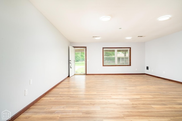 67 Razorback Dr, Hoxie, AR 72433 - empty room with light wood-style floors and baseboards
